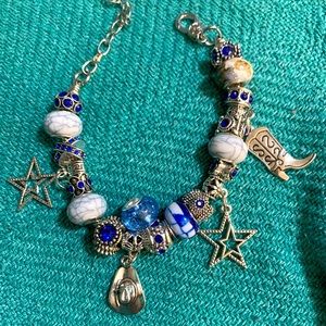 Dallas Cowboys Pandora style charm bracelet 65$ make a counter I might take it!